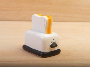 Toast and toaster sale and pepper pots